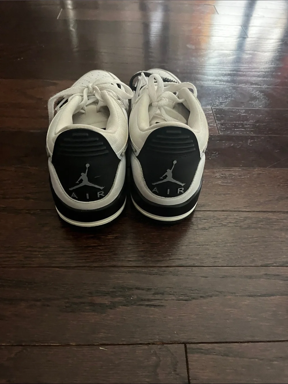 Nike White Low-Top Sneakers with Black Strap Accents